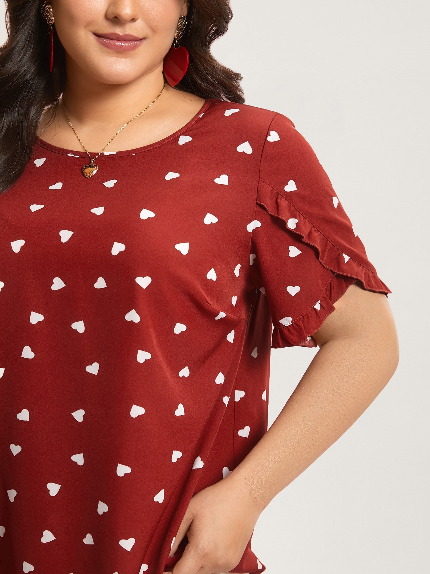Ruffled Overlap Sleeve Heart Pattern Blouse